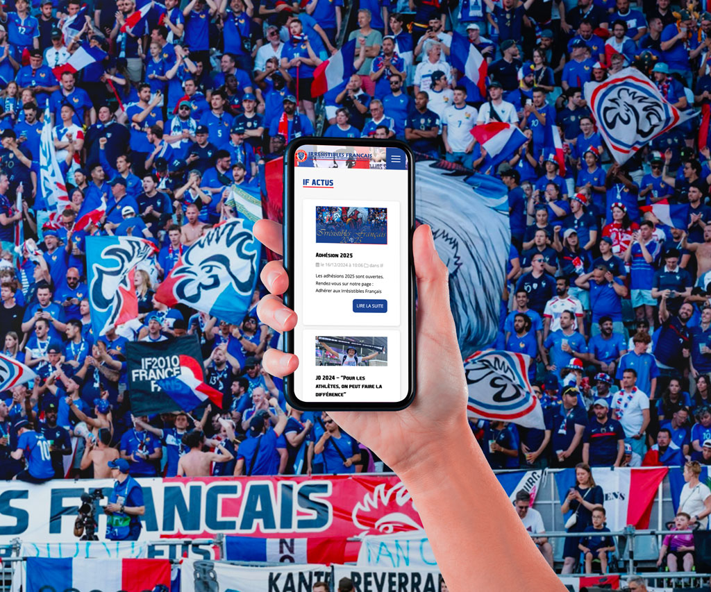 Main tenant un smartphone affichant le site Les Irrésistibles Français en contexte de stade — IF Actus mobile